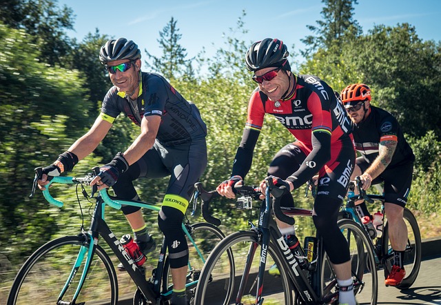 Three men riding road bikes